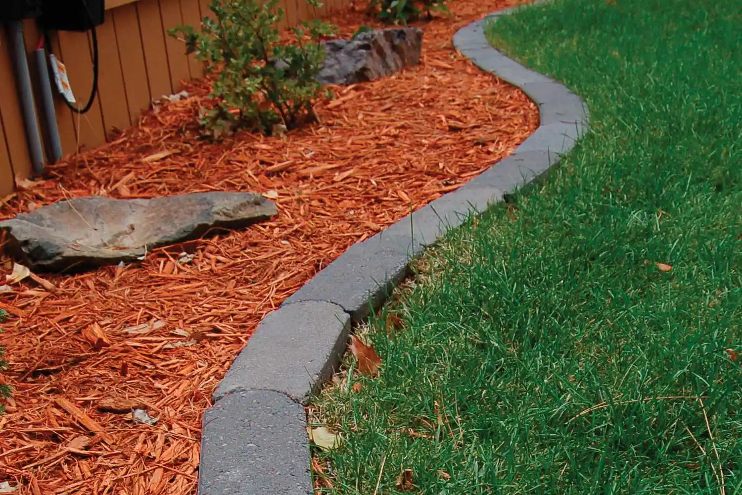 Landscape Edging — Steel, aluminum and stone edging to keep beds crisp and rock in place.